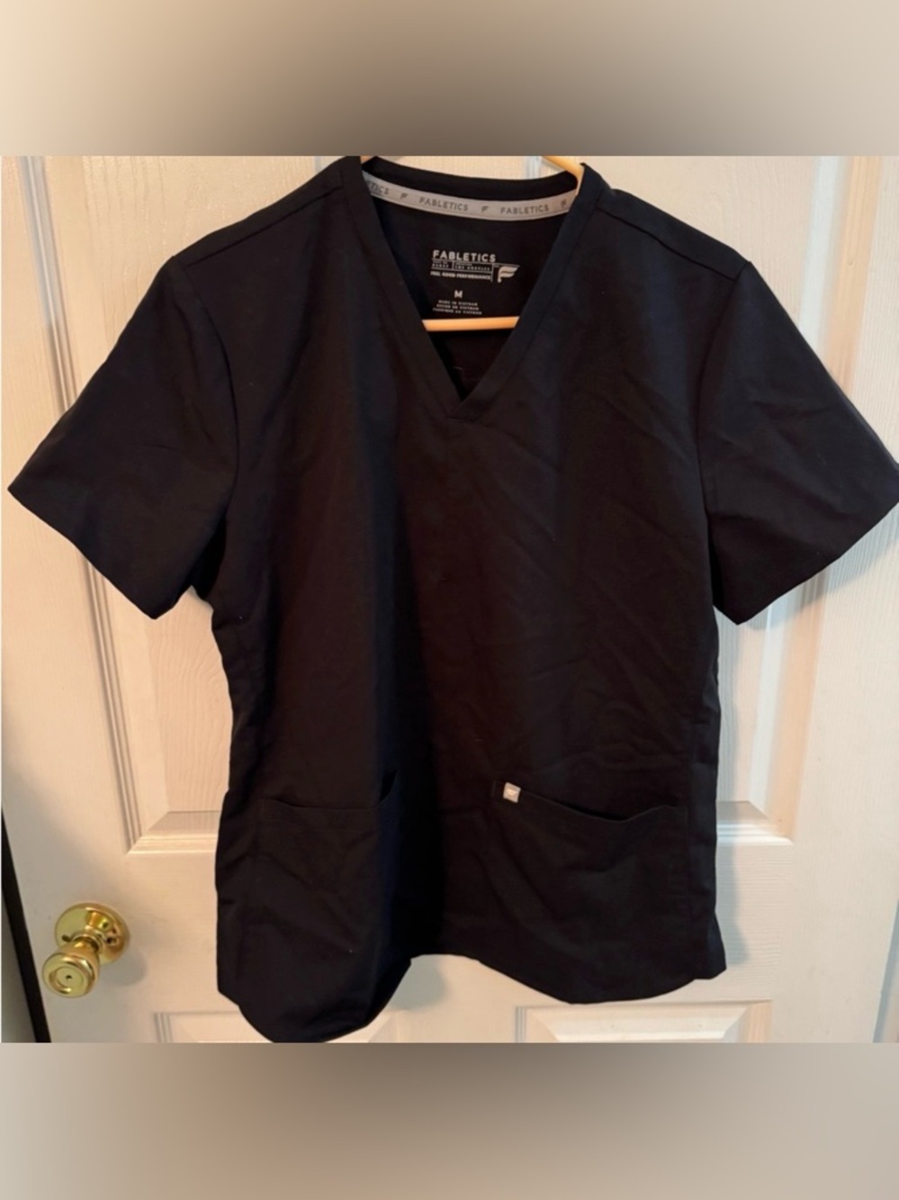 Fabletics women’s black scrub top